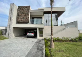 Foto 1 de Casa de Condomínio com 5 Quartos à venda, 430m² em Alphaville Jacuhy, Serra