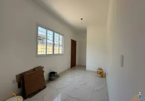 Foto 1 de Casa com 2 Quartos à venda, 68m² em Areia Branca, Santos