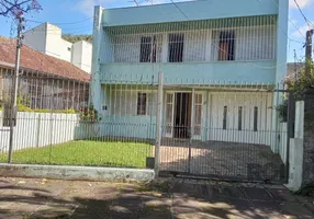 Foto 1 de Casa com 4 Quartos à venda, 330m² em Santo Antônio, Porto Alegre