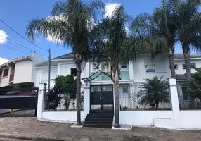 Foto 1 de Casa com 6 Quartos à venda, 493m² em Jardim Floresta, Porto Alegre