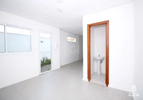 Foto 1 de Casa de Condomínio com 2 Quartos à venda, 80m² em Vila Nova, Porto Alegre