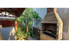 Foto 1 de Casa com 5 Quartos à venda, 290m² em Jardim Guaiúba, Guarujá