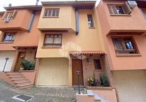 Foto 1 de Casa de Condomínio com 3 Quartos à venda, 151m² em Espiríto Santo, Porto Alegre