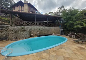 Foto 1 de Casa de Condomínio com 3 Quartos à venda, 325m² em Serra da Cantareira, Mairiporã