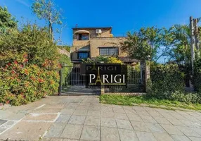 Foto 1 de Casa com 4 Quartos para venda ou aluguel, 231m² em Cristal, Porto Alegre
