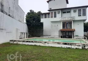 Foto 1 de Casa de Condomínio com 5 Quartos à venda, 377m² em Barra da Tijuca, Rio de Janeiro