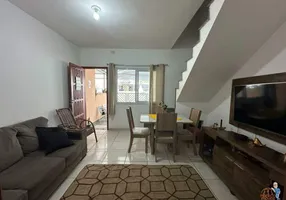 Foto 1 de Casa com 2 Quartos à venda, 61m² em Vila Voturua, São Vicente