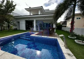 Foto 1 de Casa com 5 Quartos à venda, 390m² em Alphaville Fortaleza, Eusébio