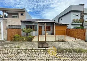 Foto 1 de Casa com 2 Quartos à venda, 300m² em Vila Nova, Porto Alegre