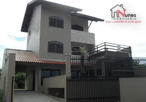 Foto 1 de Sobrado com 4 Quartos à venda, 229m² em Coroados, Guaratuba