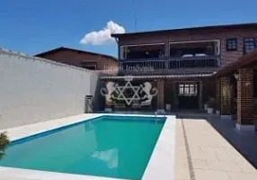 Foto 1 de Sobrado com 5 Quartos à venda, 380m² em Jardim Primavera, Caraguatatuba