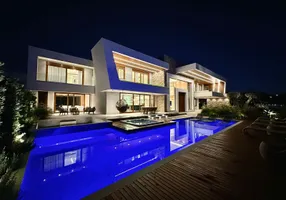 Foto 1 de Casa de Condomínio com 7 Quartos à venda, 907m² em Condominio Velas da Marina, Capão da Canoa