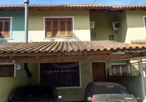 Foto 1 de Sobrado com 3 Quartos à venda, 89m² em Hípica, Porto Alegre