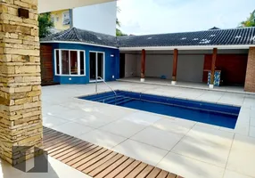 Foto 1 de Casa de Condomínio com 4 Quartos à venda, 507m² em Barra da Tijuca, Rio de Janeiro