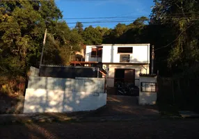 Foto 1 de Casa com 2 Quartos à venda, 141m² em Alto Petrópolis, Porto Alegre