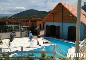 Foto 1 de Casa de Condomínio com 3 Quartos para venda ou aluguel, 180m² em Penedo, Itatiaia
