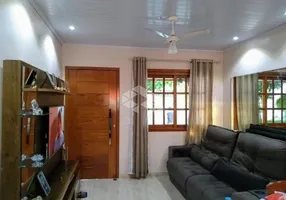 Foto 1 de Casa com 2 Quartos à venda, 57m² em Auxiliadora, Gravataí