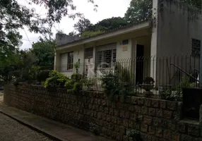 Foto 1 de Casa de Condomínio com 3 Quartos à venda, 86m² em Teresópolis, Porto Alegre