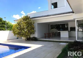 Foto 1 de Casa com 4 Quartos à venda, 480m² em Barra da Tijuca, Rio de Janeiro