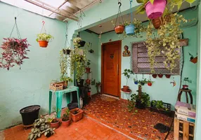 Foto 1 de Casa com 2 Quartos à venda, 92m² em Macuco, Santos
