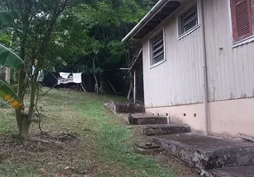 Foto 1 de Casa com 2 Quartos à venda, 100m² em Vila Nova, Porto Alegre