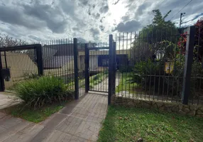 Foto 1 de Casa com 4 Quartos para alugar, 470m² em Chácara das Pedras, Porto Alegre