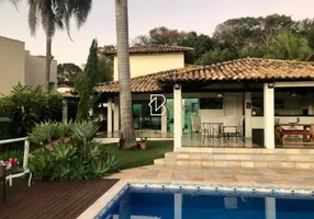 Foto 1 de Casa de Condomínio com 7 Quartos à venda, 352m² em Escarpas do Lago, Capitólio