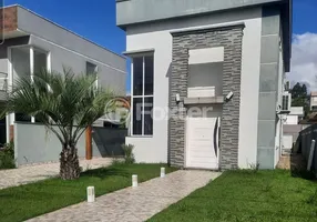 Foto 1 de Casa de Condomínio com 4 Quartos à venda, 187m² em Condominio Buena Vista, Viamão