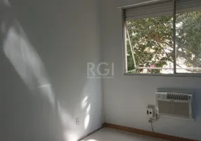 Foto 1 de Apartamento com 2 Quartos à venda, 60m² em Vila Nova, Porto Alegre