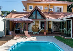 Foto 1 de Casa com 3 Quartos à venda, 246m² em Vila Ipiranga, Porto Alegre