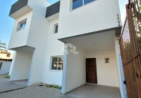 Foto 1 de Casa de Condomínio com 3 Quartos à venda, 237m² em Camaquã, Porto Alegre