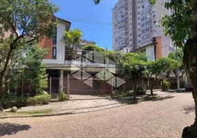 Foto 1 de Casa com 4 Quartos à venda, 480m² em Bela Vista, Porto Alegre