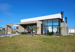 Foto 1 de Casa de Condomínio com 3 Quartos à venda, 218m² em Condominio Lagoa do Passo, Xangri-lá