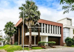 Foto 1 de Casa de Condomínio com 3 Quartos à venda, 735m² em Cacupé, Florianópolis