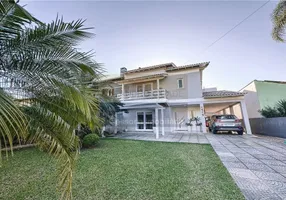 Foto 1 de Casa de Condomínio com 3 Quartos à venda, 298m² em Cantegril, Viamão