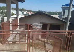 Foto 1 de Casa com 2 Quartos à venda, 54m² em Tarumã, Viamão