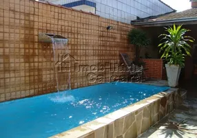 Foto 1 de Sobrado com 4 Quartos à venda, 89m² em Vila Tupi, Praia Grande