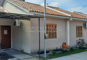 Foto 1 de Casa de Condomínio com 2 Quartos à venda, 56m² em Chácara, Eldorado do Sul