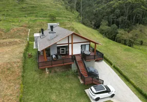 Foto 1 de Casa de Condomínio com 4 Quartos à venda, 220m² em Invernadinha, Rancho Queimado