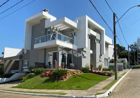 Foto 1 de Casa de Condomínio com 3 Quartos à venda, 203m² em Hípica, Porto Alegre