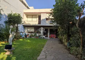Foto 1 de Casa com 5 Quartos à venda, 251m² em Passo da Areia, Porto Alegre