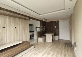 Foto 1 de Apartamento com 2 Quartos à venda, 58m² em Vila Nova, Porto Alegre