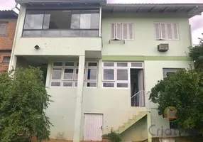 Foto 1 de Sobrado com 4 Quartos à venda, 166m² em Vila Nova, Novo Hamburgo