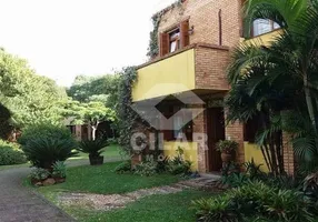 Foto 1 de Casa de Condomínio com 3 Quartos à venda, 149m² em Vila Nova, Porto Alegre