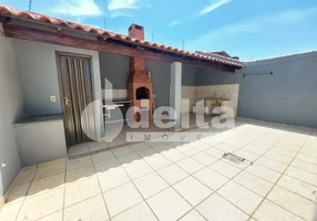 Foto 1 de Casa com 4 Quartos à venda, 230m² em Segismundo Pereira, Uberlândia