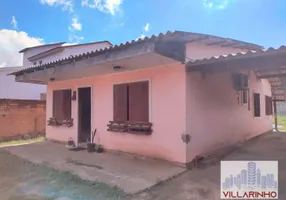 Foto 1 de Casa com 2 Quartos à venda, 105m² em Vila Nova, Porto Alegre