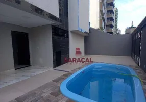 Foto 1 de Sobrado com 3 Quartos à venda, 86m² em Vila Tupi, Praia Grande