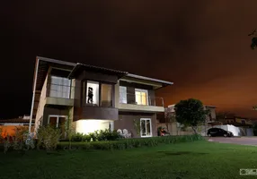 Foto 1 de Casa de Condomínio com 4 Quartos à venda, 400m² em Condomínio Belvedere, Cuiabá