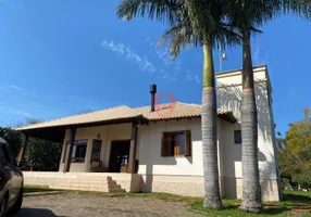 Foto 1 de Casa de Condomínio com 3 Quartos à venda, 262m² em Bosques do Sul, Gravataí