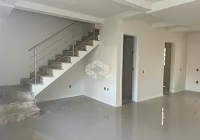 Foto 1 de Sobrado com 3 Quartos à venda, 82m² em Fátima, Canoas